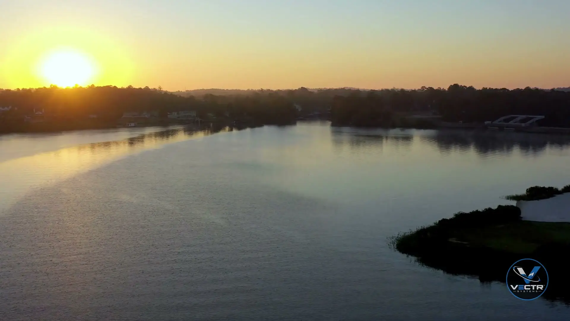 Still from an aerial sunrise flyover over Lake Tobesofkee